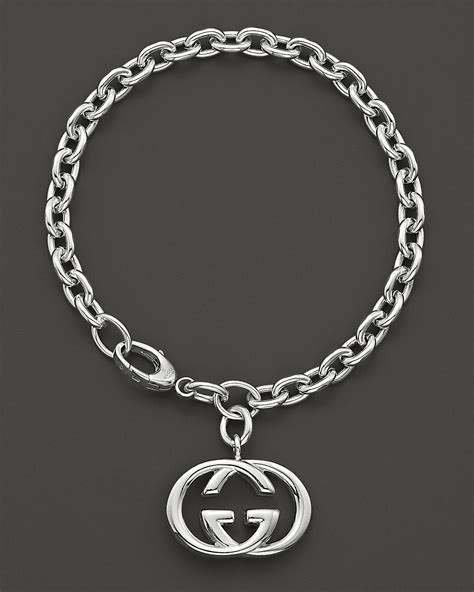 gucci silver britt logo bracelet|gucci bracelets cheapest.